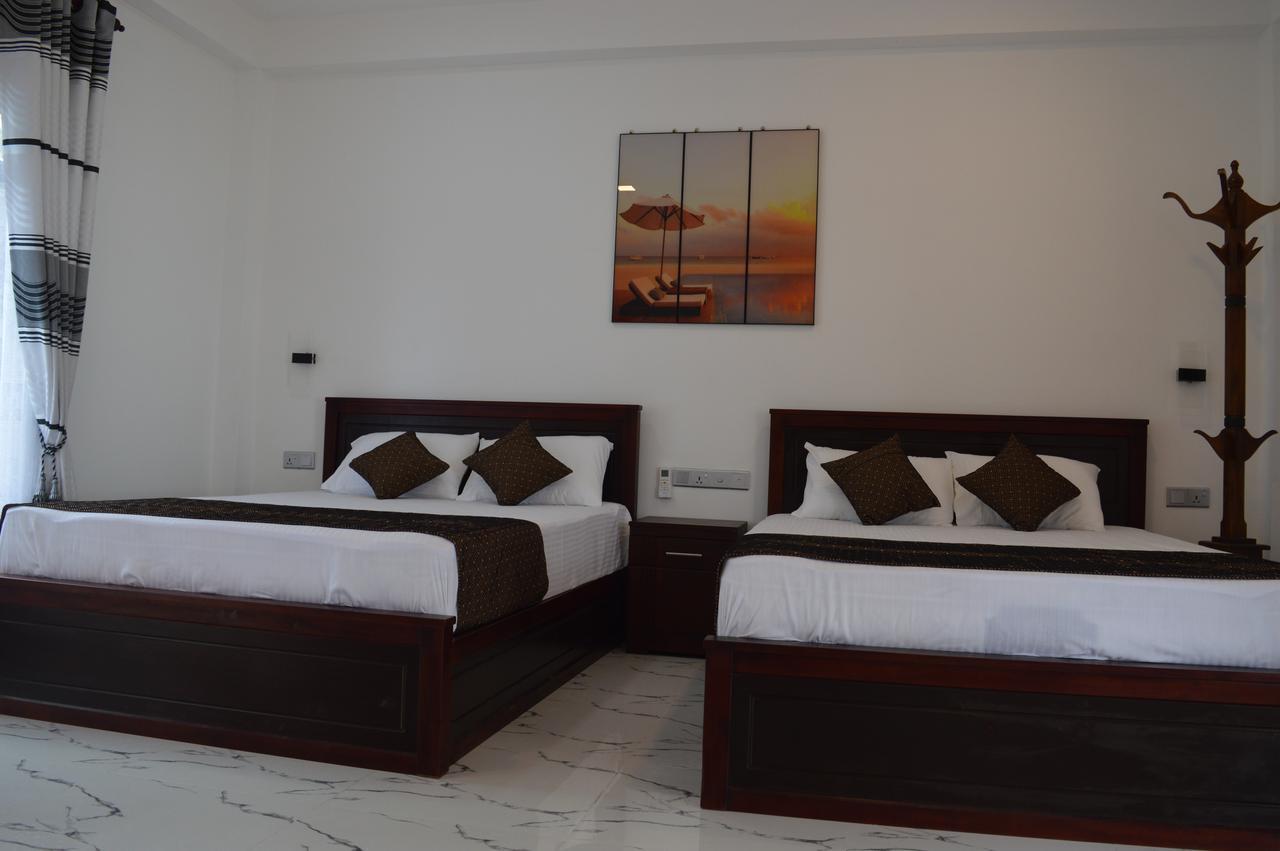 טרינקומאלה Blue Wings Beach Hotel מראה חיצוני תמונה